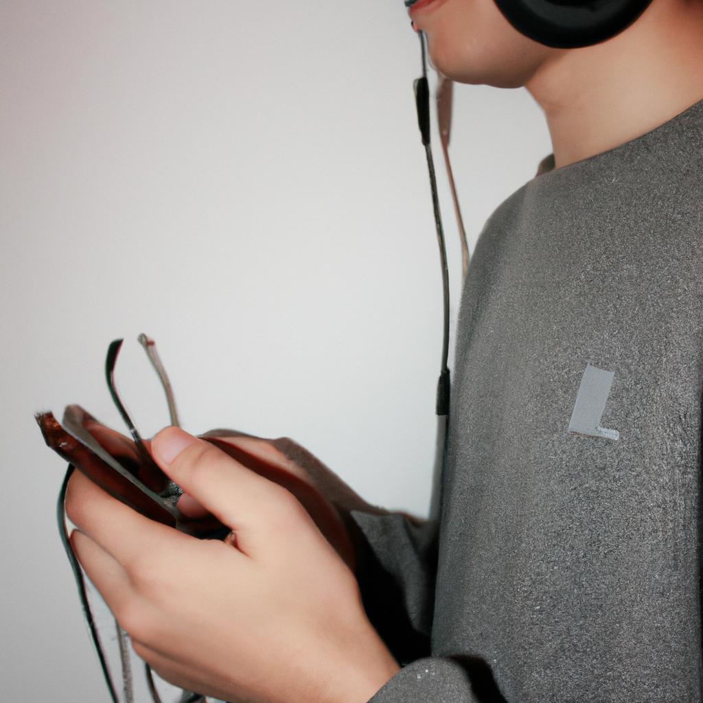 Person wearing headphones, browsing apps