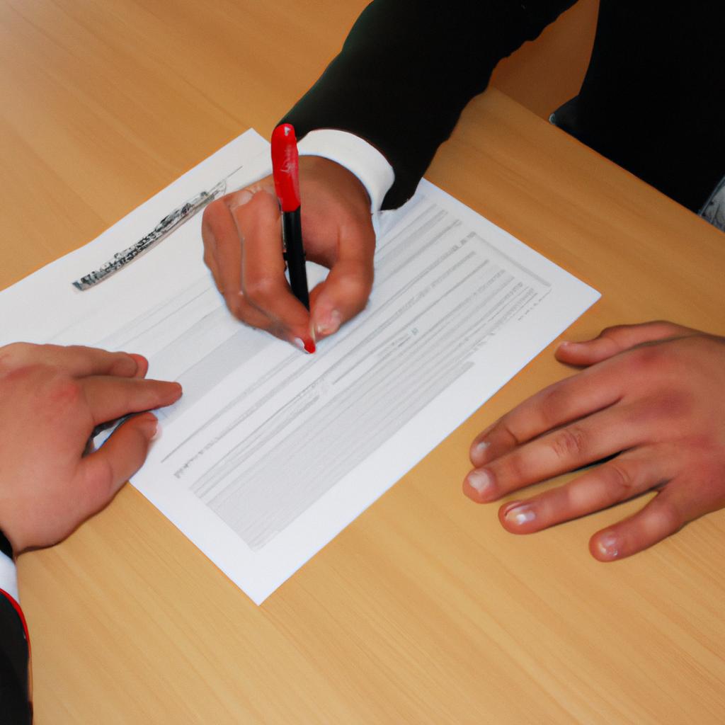 Person signing sponsorship agreement contract